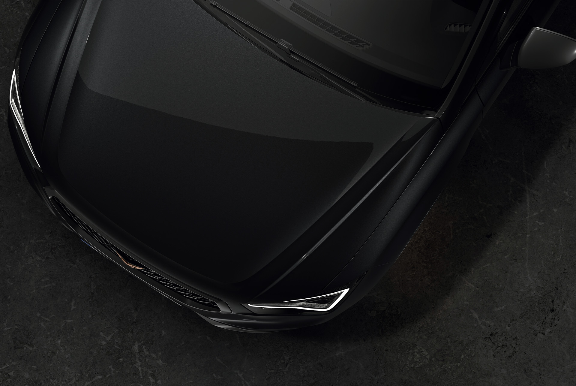 Vista dall'alto di CUPRA Ateca in Magic Black, che mette in risalto il colore audace ed elegante della vettura. 